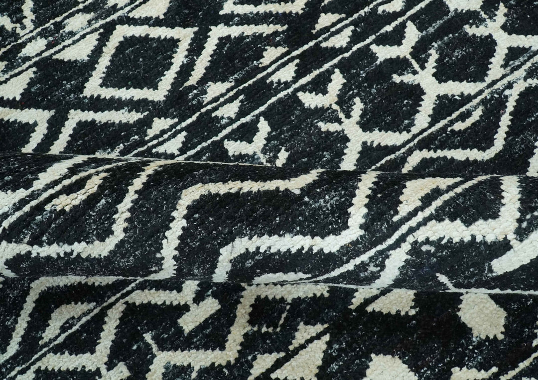 5.6x8.6 Black and Ivory Hand Knotted Southwestern Tribal Trellis wool Area Rug - The Rug Decor