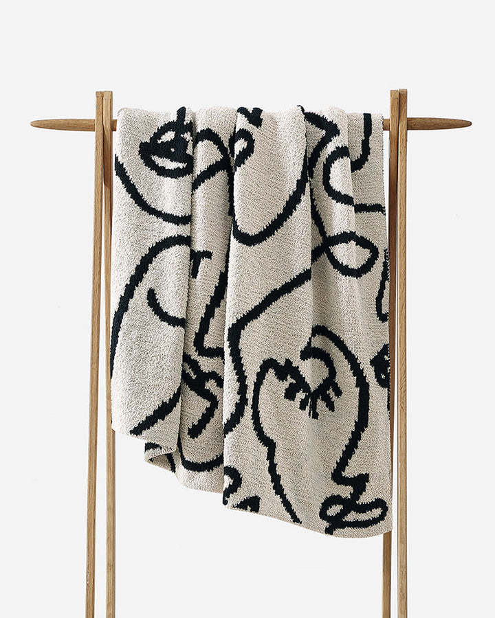 Soft and Stylish Cozy Face Design Woven Throw