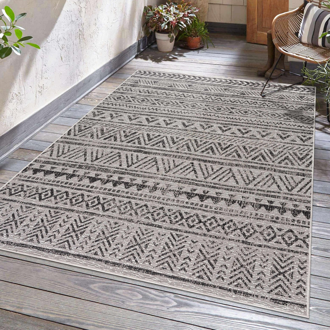 Modern Stripes Chevron Design Ivory and Charcoal Outdoor Safe Area Rug - The Rug Decor