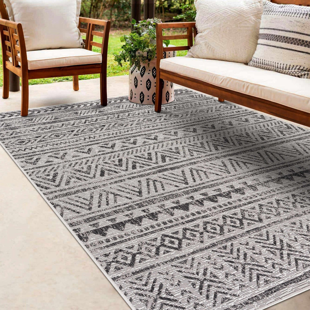 Modern Stripes Chevron Design Ivory and Charcoal Outdoor Safe Area Rug - The Rug Decor
