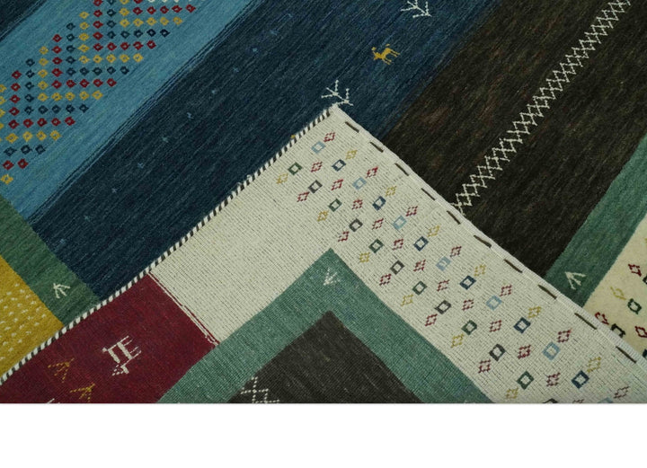 Tribal Gabbeh Blue, Gold, Maroon and Ivory Stripes design Traditional Hand loom 4.6x7 Wool Area Rug - The Rug Decor