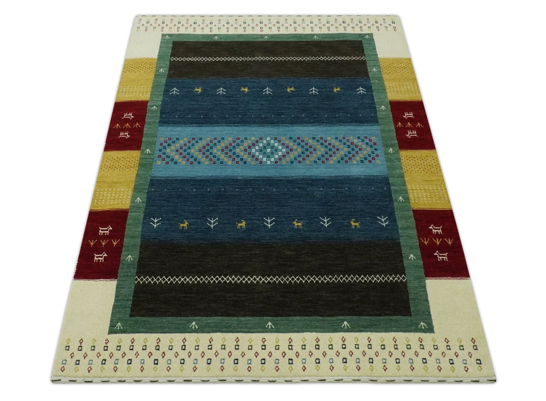 Tribal Gabbeh Blue, Gold, Maroon and Ivory Stripes design Traditional Hand loom 4.6x7 Wool Area Rug - The Rug Decor