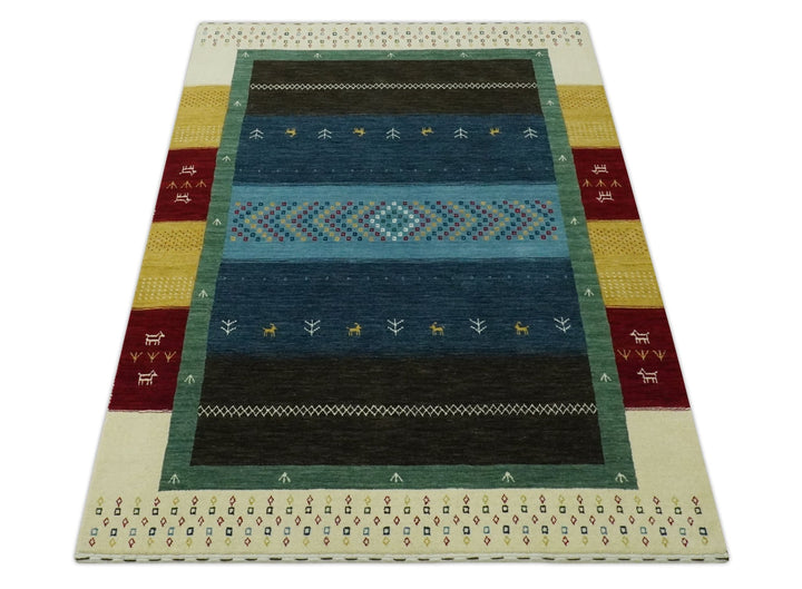 Tribal Gabbeh Blue, Gold, Maroon and Ivory Stripes design Traditional Hand loom 4.6x7 Wool Area Rug - The Rug Decor