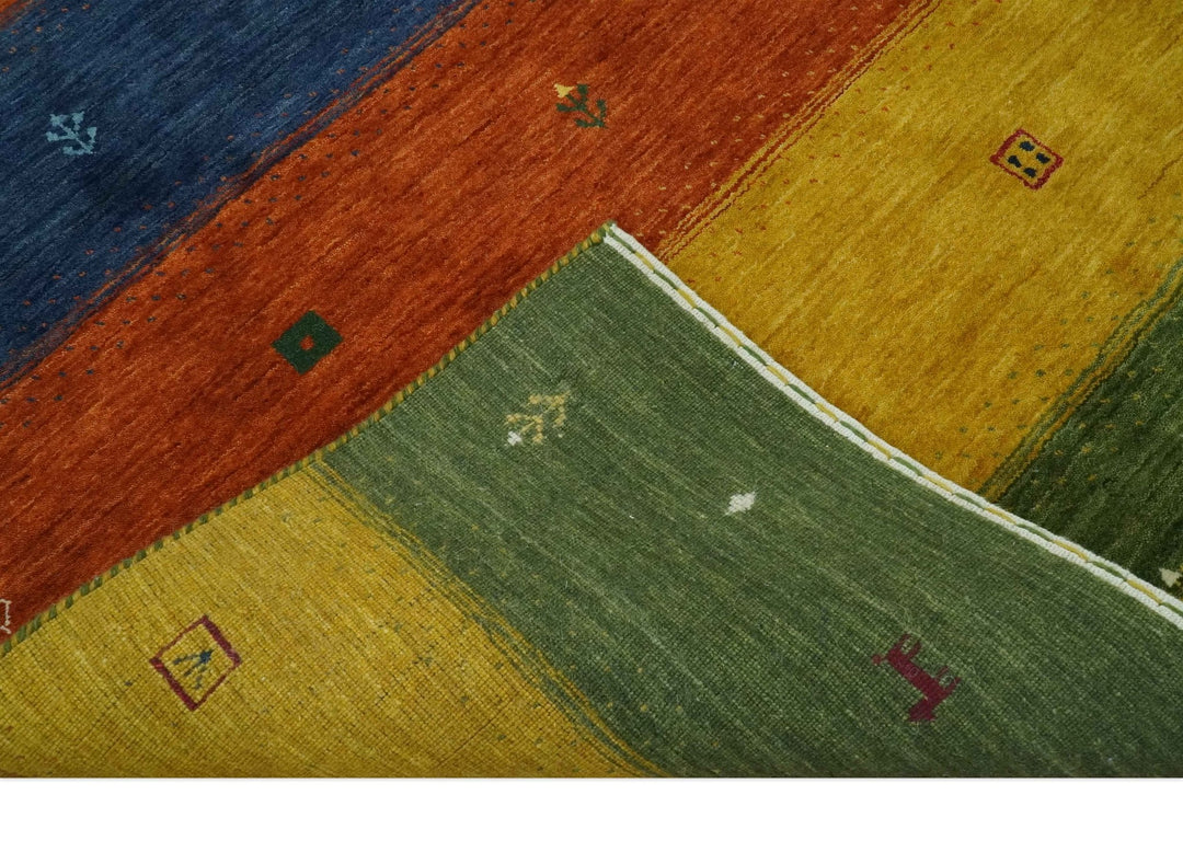 Tribal Gabbeh Green, Gold, Rust and Blue Stripes Design 4.6x7 Wool area Rug - The Rug Decor