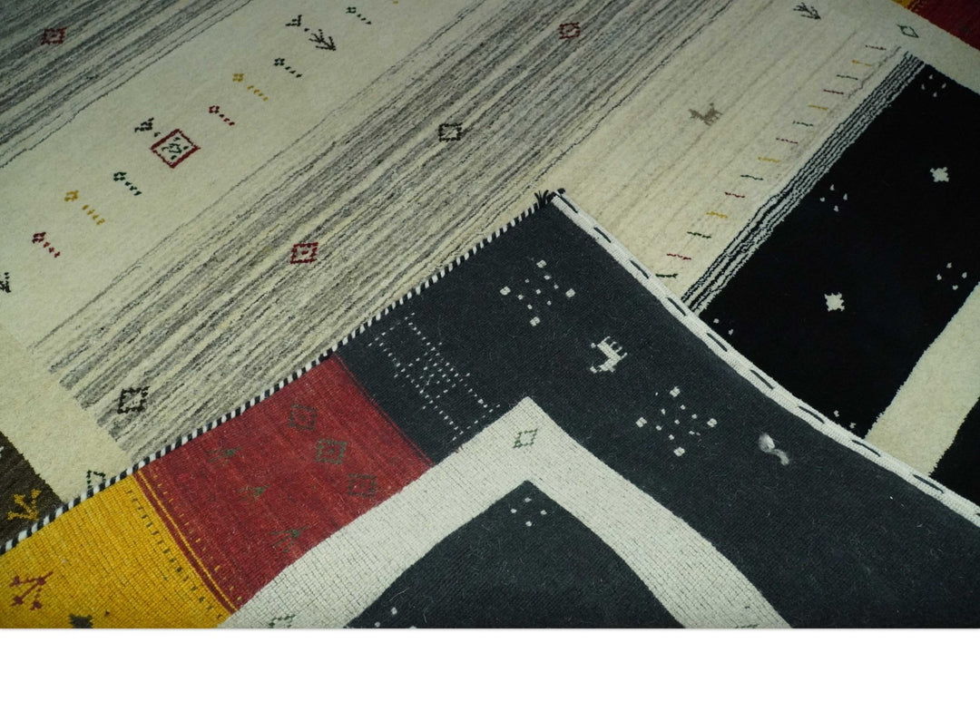 Tribal Gabbeh Ivory, Black, Gold and Maroon Stripes design Traditional Hand loom 4.6x7 Wool Area Rug - The Rug Decor