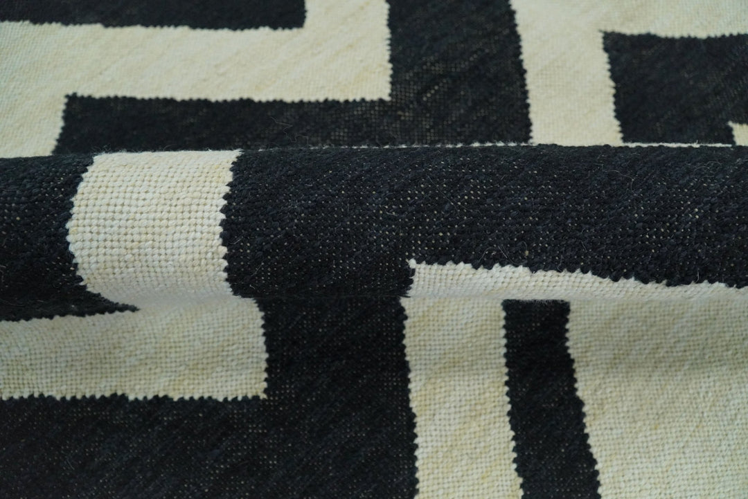 Black and Beige Outdoor Safe Hand Woven Dhurrie Rug Chevron Pattern - The Rug Decor