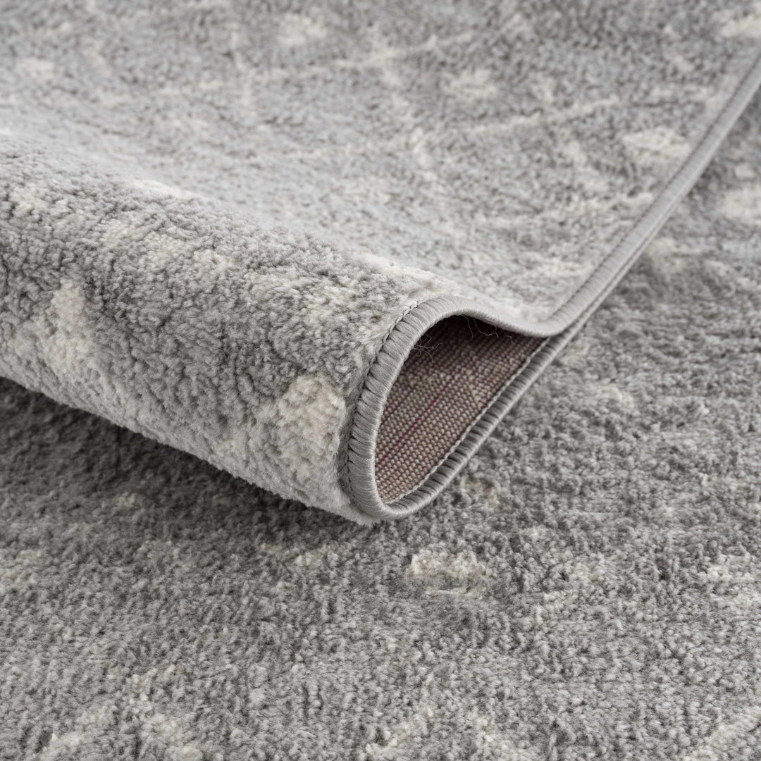 Contemporary Gray and Ivory Low pile Tribal Design Area Rug - The Rug Decor