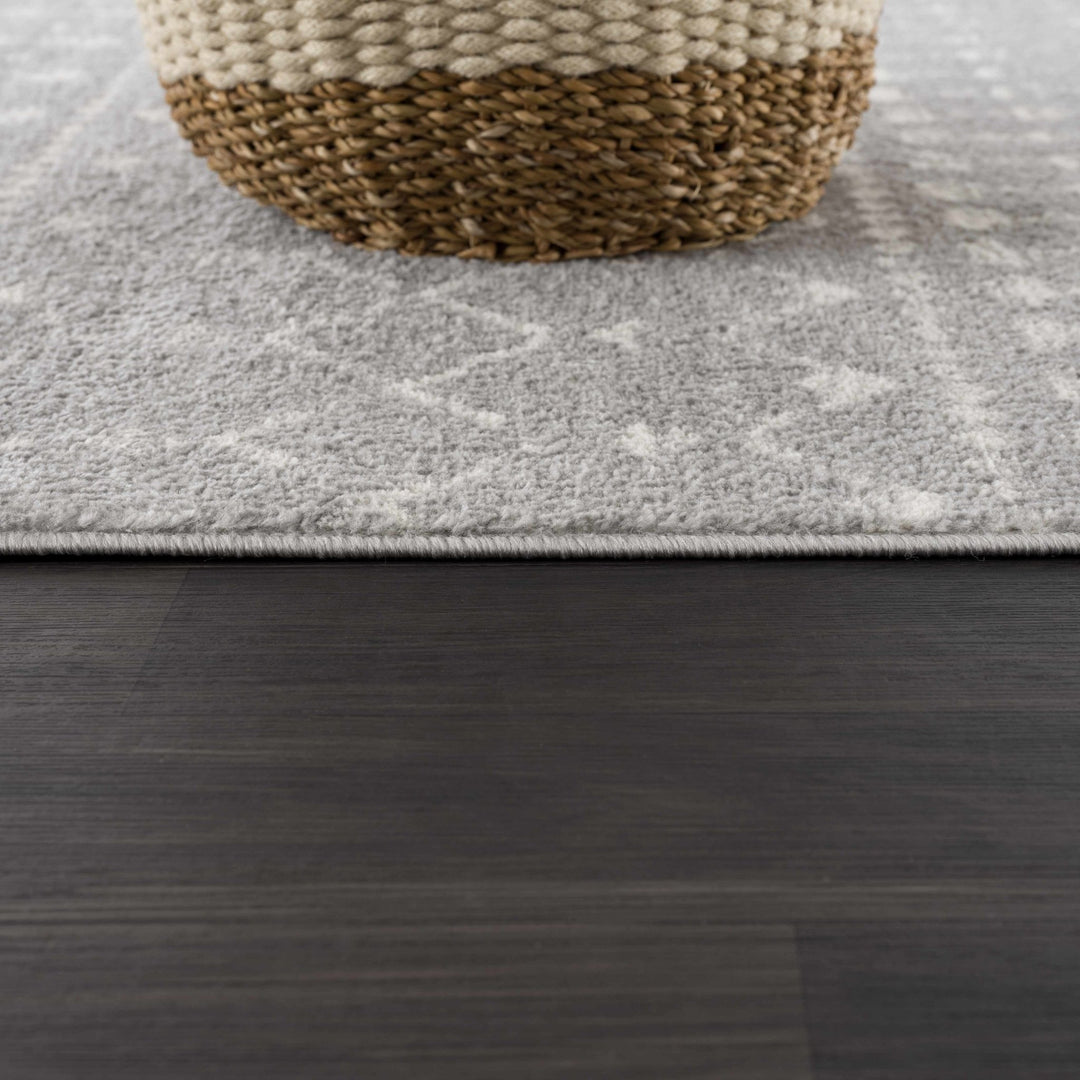 Contemporary Gray and Ivory Low pile Tribal Design Area Rug - The Rug Decor