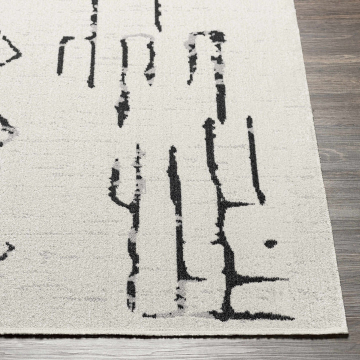 Modern Art Design Machine Woven Ivory and Black Machine Washable Rug - The Rug Decor