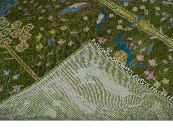 The Green Jungle Life Teal and Peach Peacock Bird Hand Knotted 8x10 Wool Area Rug - The Rug Decor