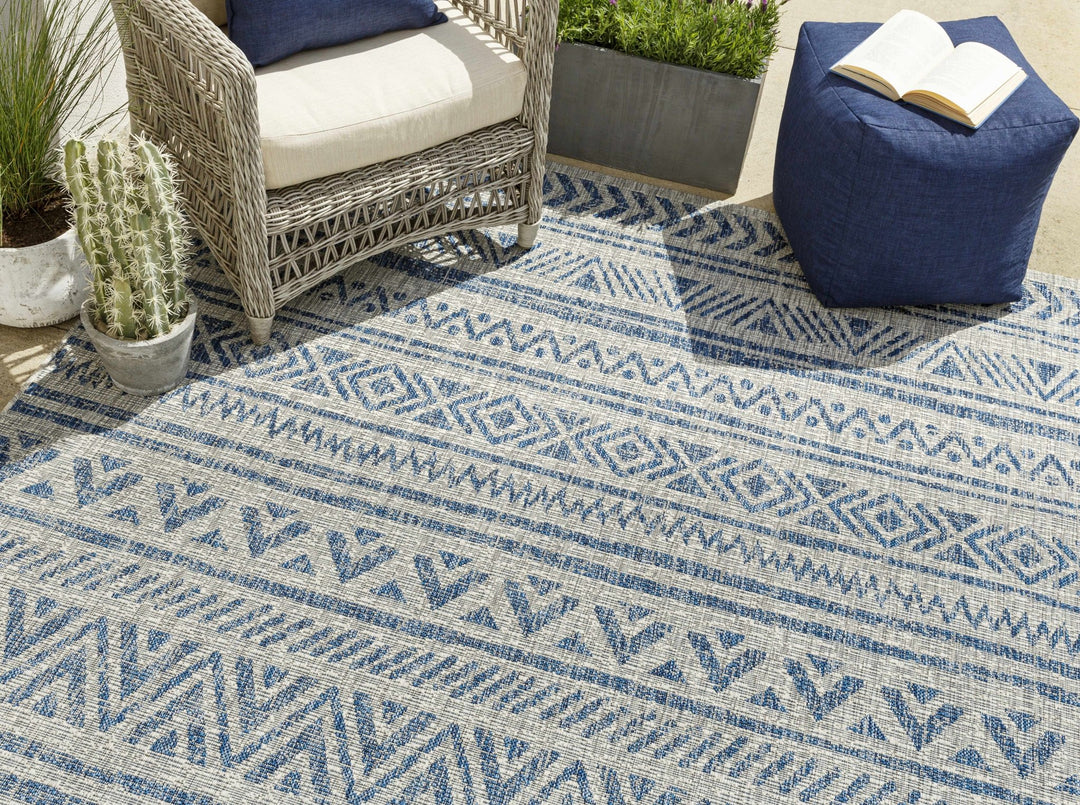 Traditional Blue and Ivory Tribal Design Outdoor Area Rug - The Rug Decor