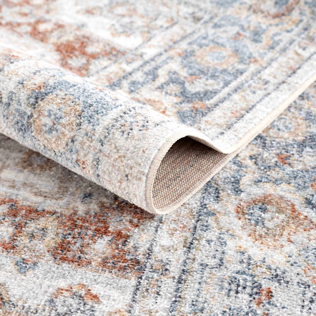 Traditional Heriz Ivory, Rust and Blue Medallion Design Low Pile Washable Area Rug - The Rug Decor