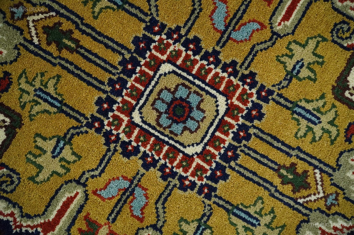 Rust and blue traditional Heriz Serapi area rug close-up of central square motif design