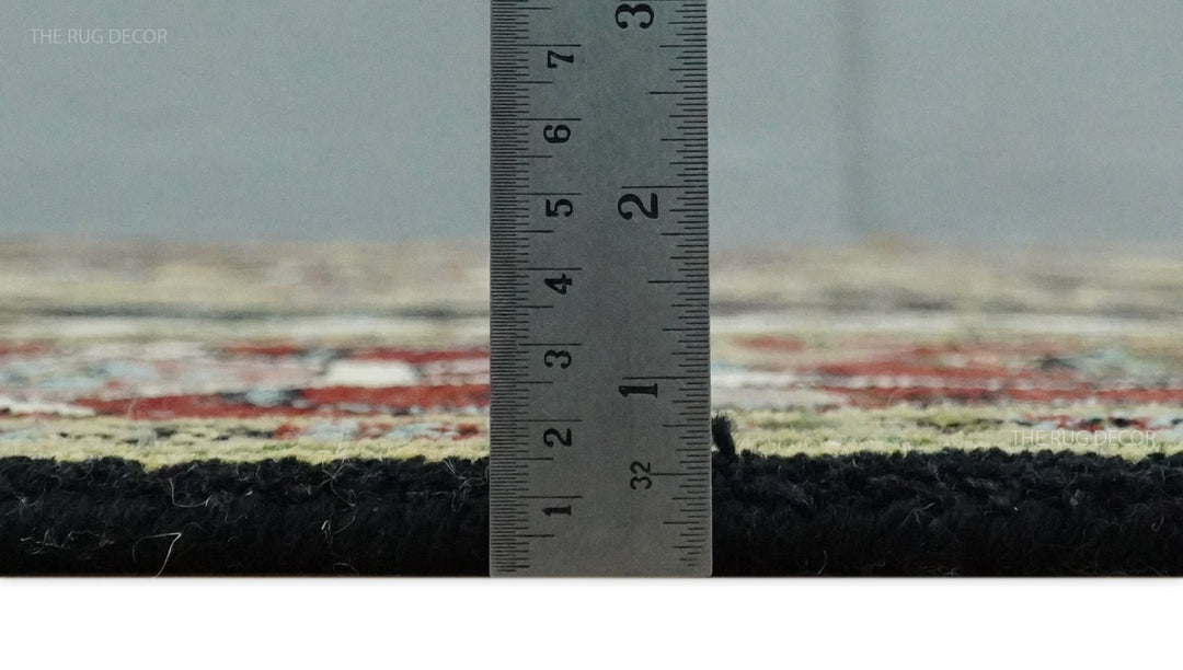 Hand-knotted wool rug edge with measuring ruler at the pile for height