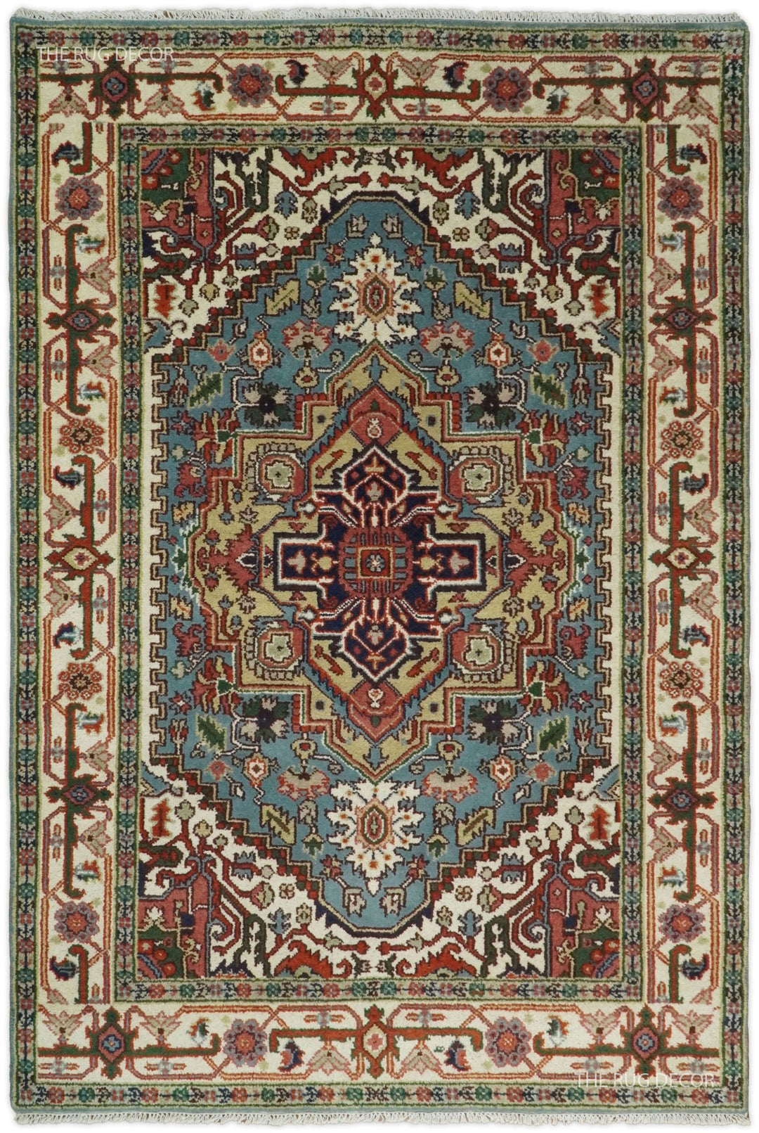 Blue and ivory hand-knotted wool rug with a central medallion and ornate floral border