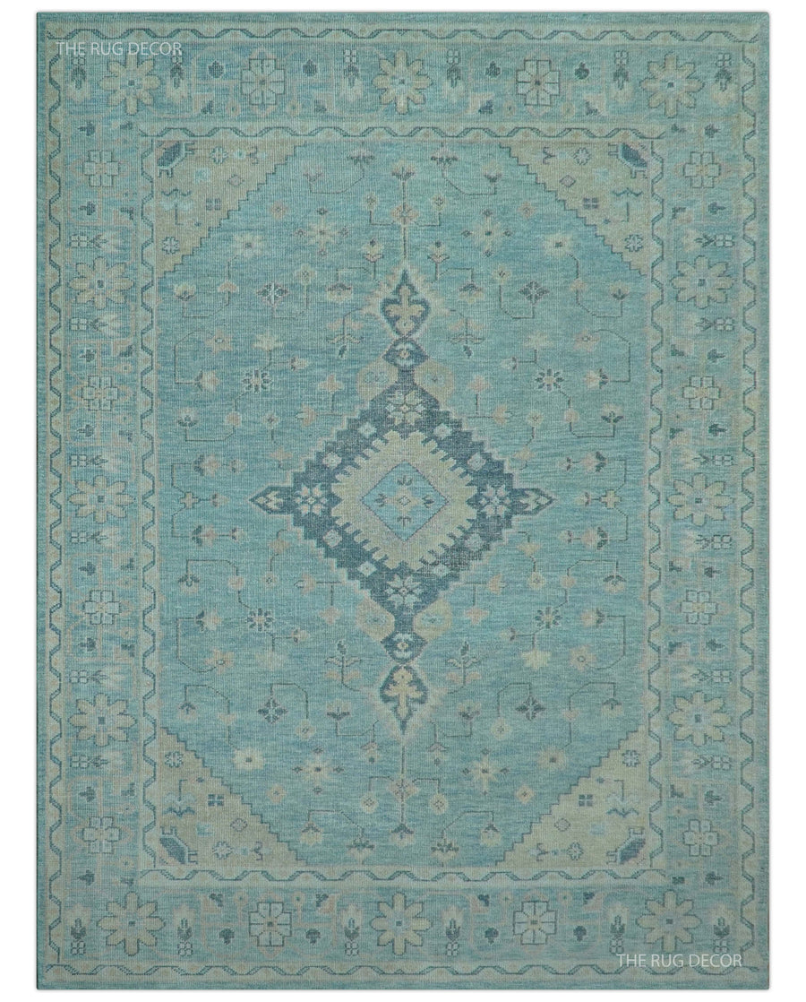 Hand-knotted wool area rug with blue field and beige medallion geometric pattern