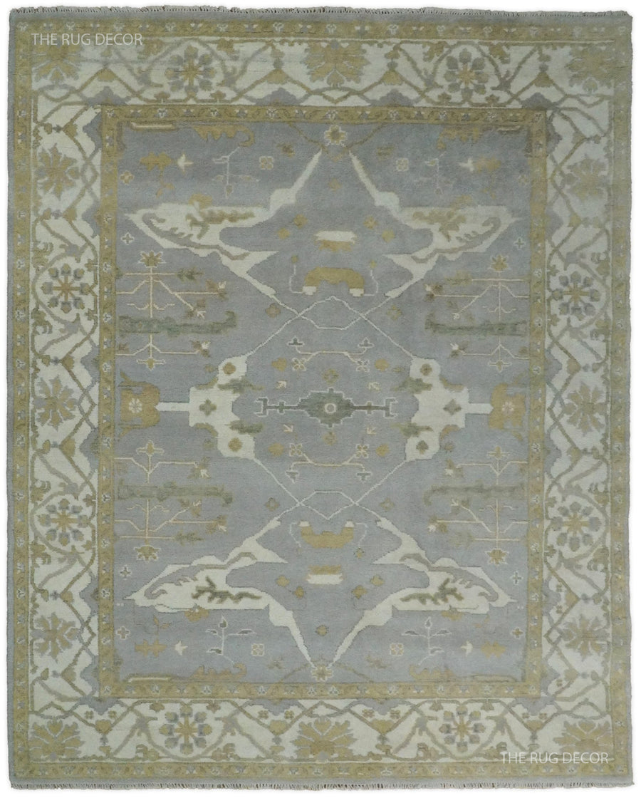 Gray and ivory hand-knotted wool Oushak rug with ornate central medallion and floral border