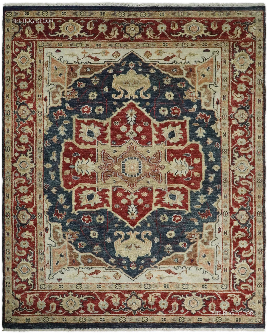 Red and blue hand-knotted wool rug with a traditional Serapi medallion and ornate border