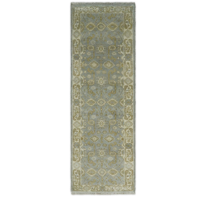 Gray and beige Oushak wool runner rug with ornate floral medallion pattern and border