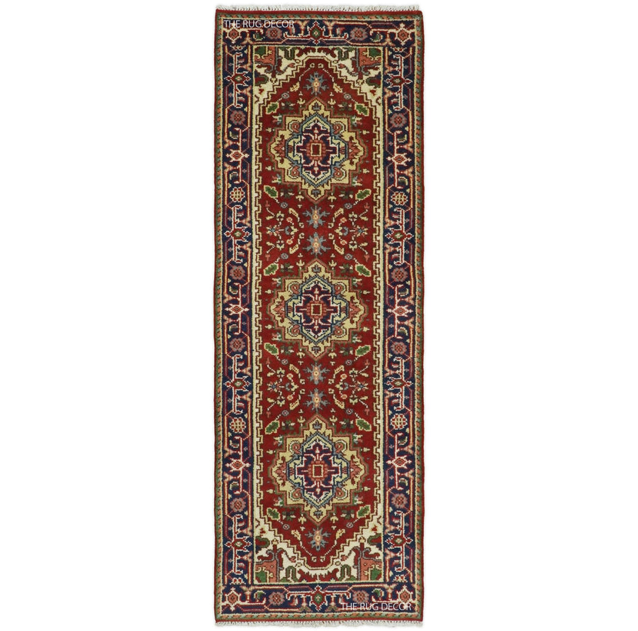 Traditional red and blue hand-knotted wool runner rug with three central medallions