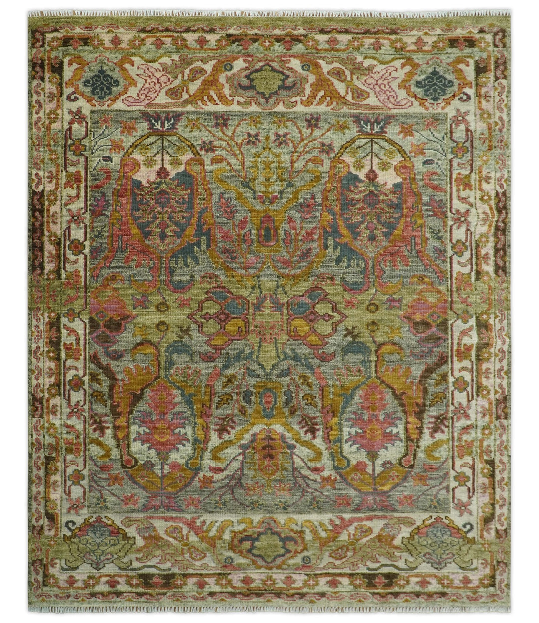 Hand-knotted wool rug with green and gold ornate medallion pattern
