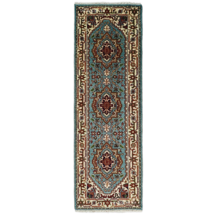 Blue and ivory hand-knotted wool runner rug with traditional floral medallions