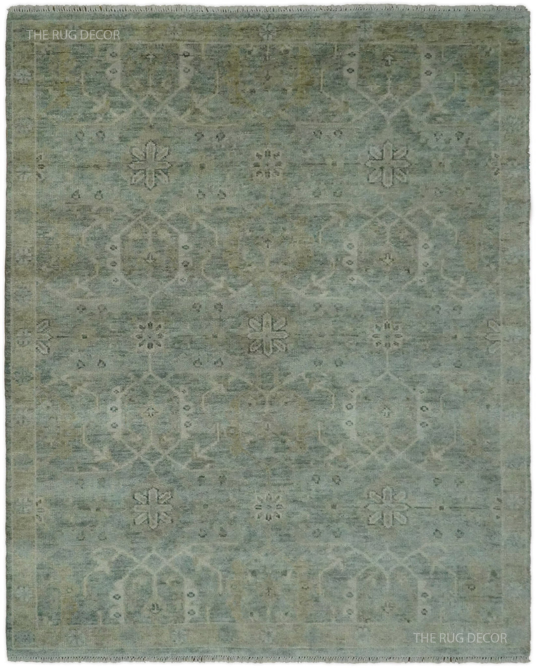 Blue and ivory hand-knotted wool rug with a traditional floral pattern and border