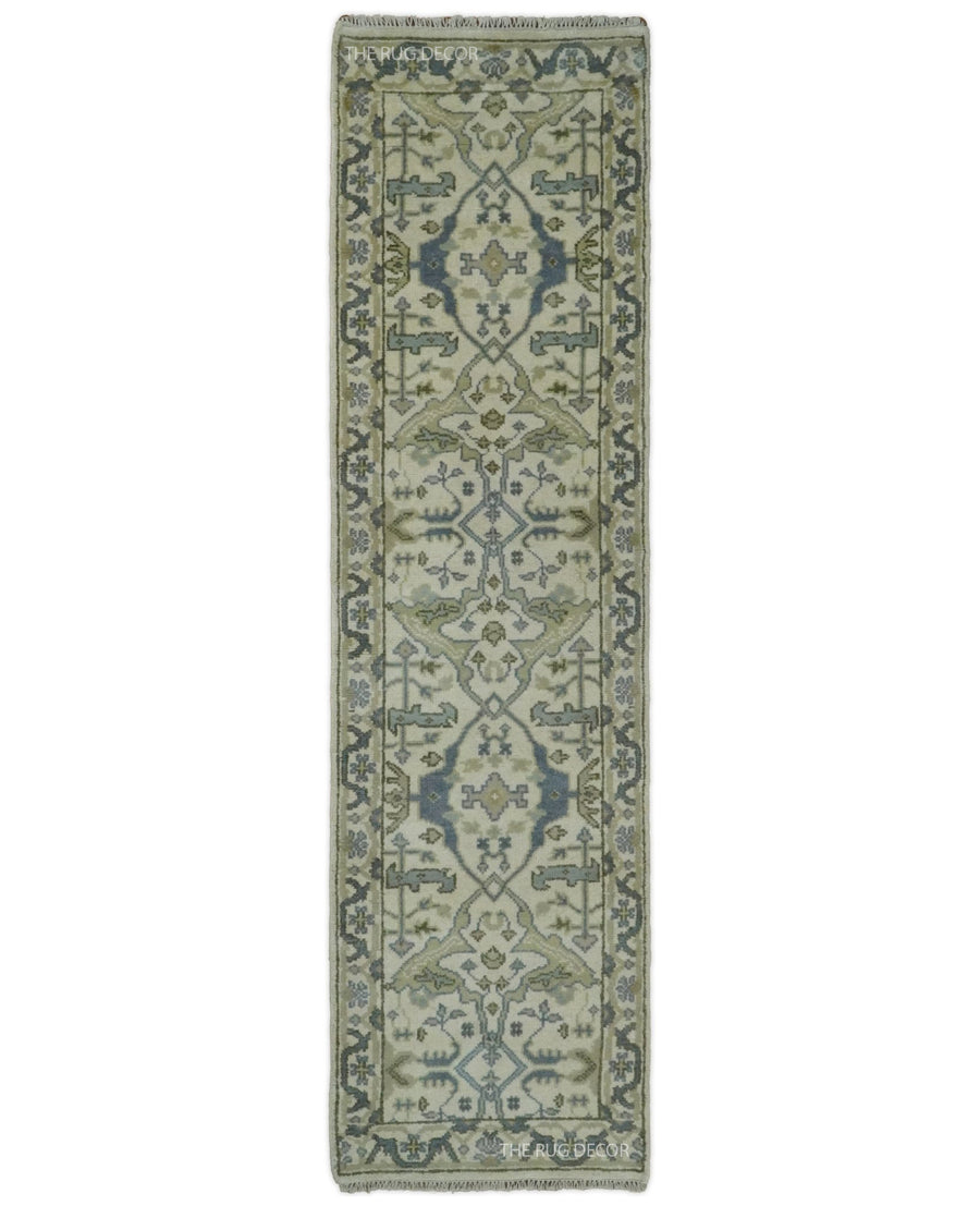 Ivory and blue hand-knotted wool runner with a classic geometric floral pattern