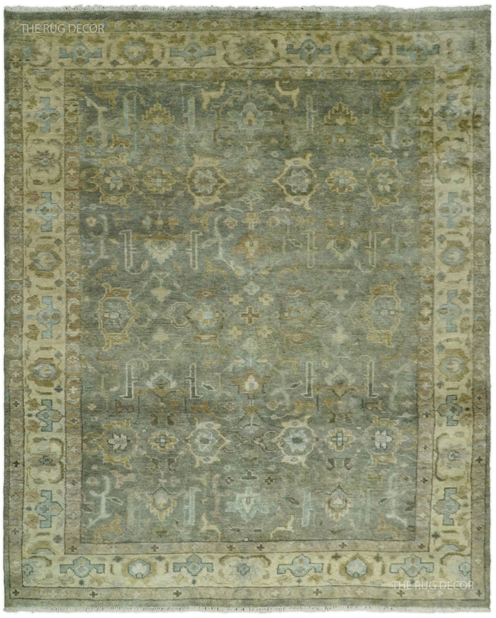 Vintage-style Turkish rug with ornate medallion pattern in gray and beige, distressed look
