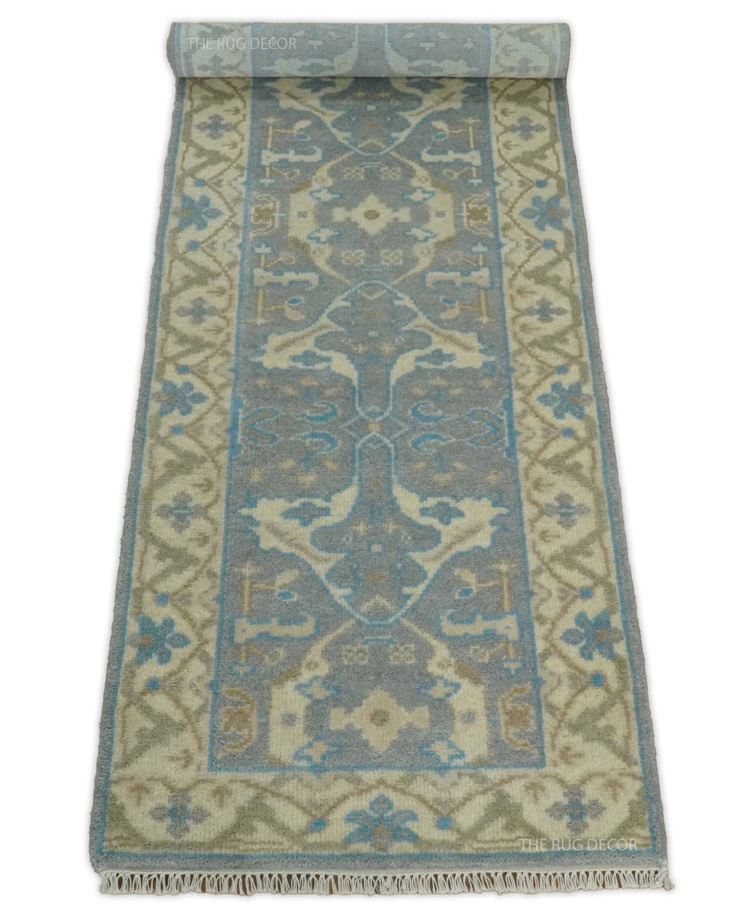 Hand-knotted Oushak runner with a central medallion pattern, beige border, and fringed end