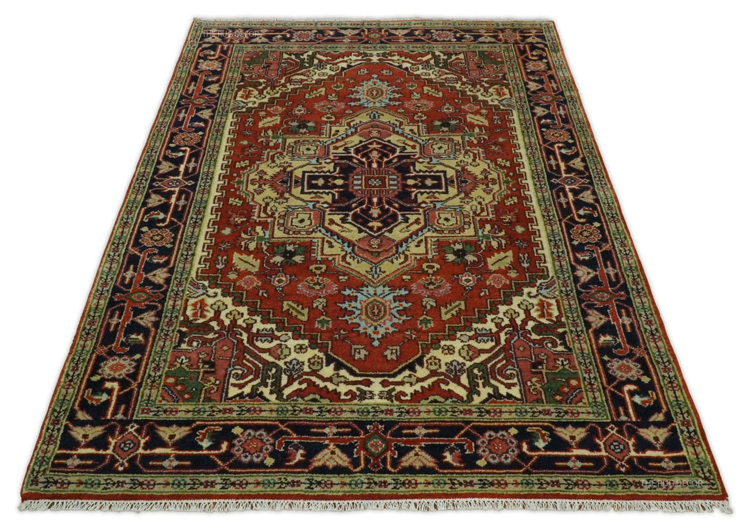 Traditional medallion rug shown top-down with rust red field, dark blue edges, and cream details