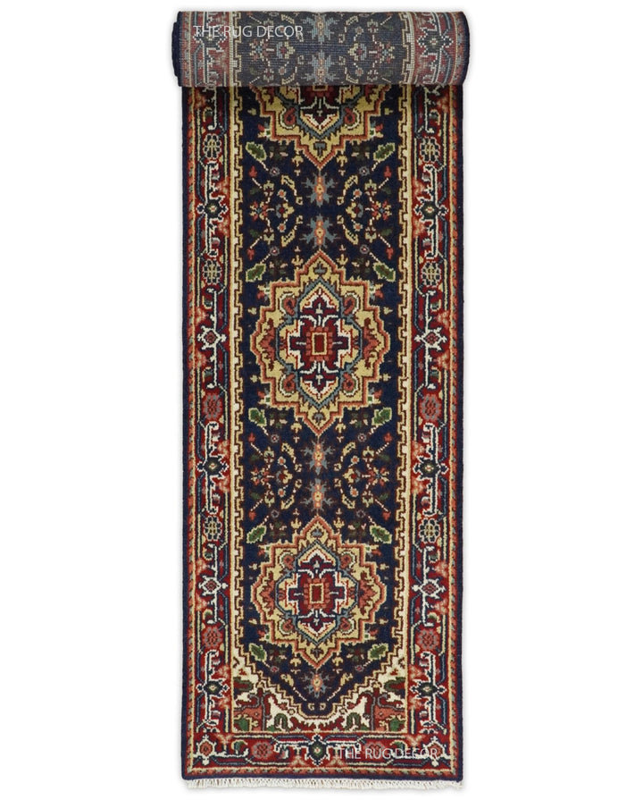 Traditional wool runner rug partially rolled to show its patterned underside