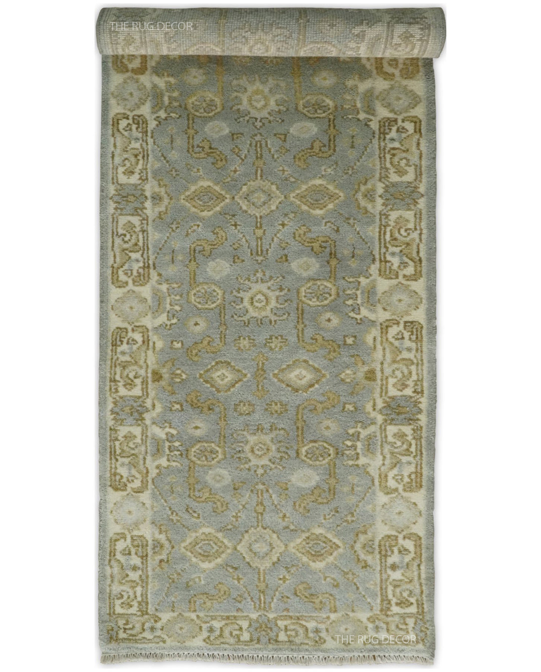 Rolled end of the patterned wool runner showing its decorative design
