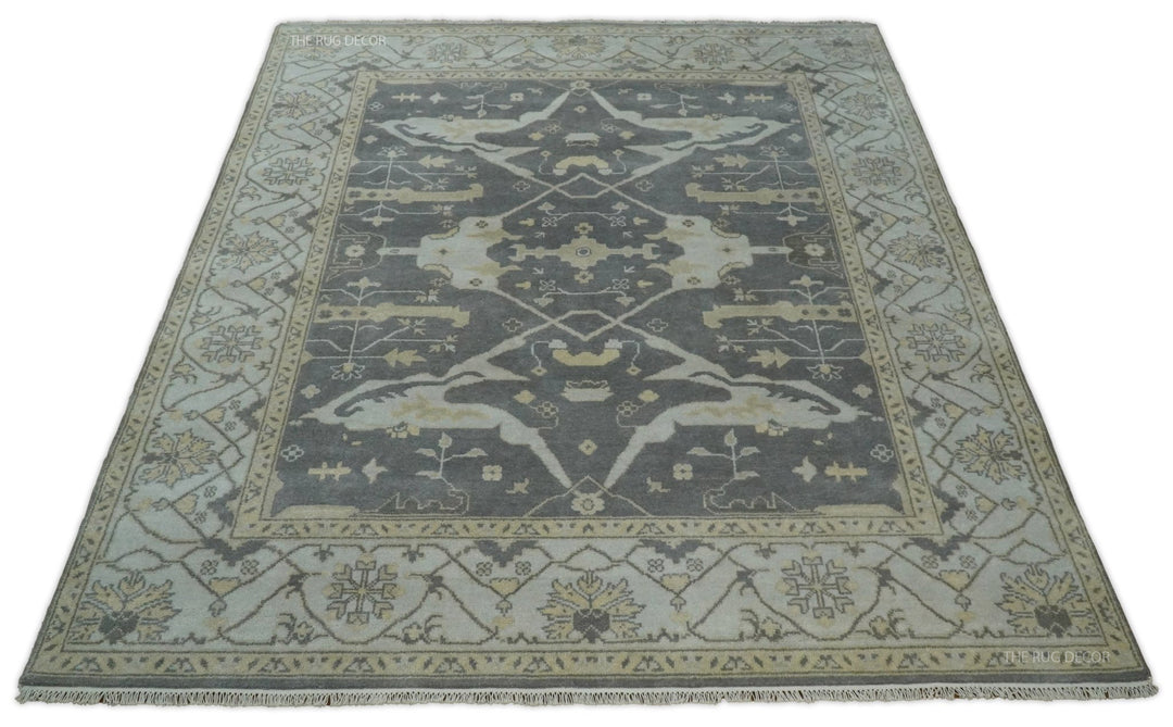 Vintage Oushak-style wool area rug with border details in gray and ivory