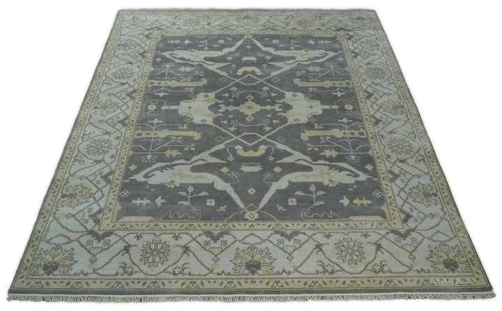 Vintage Oushak-style wool area rug with border details in gray and ivory