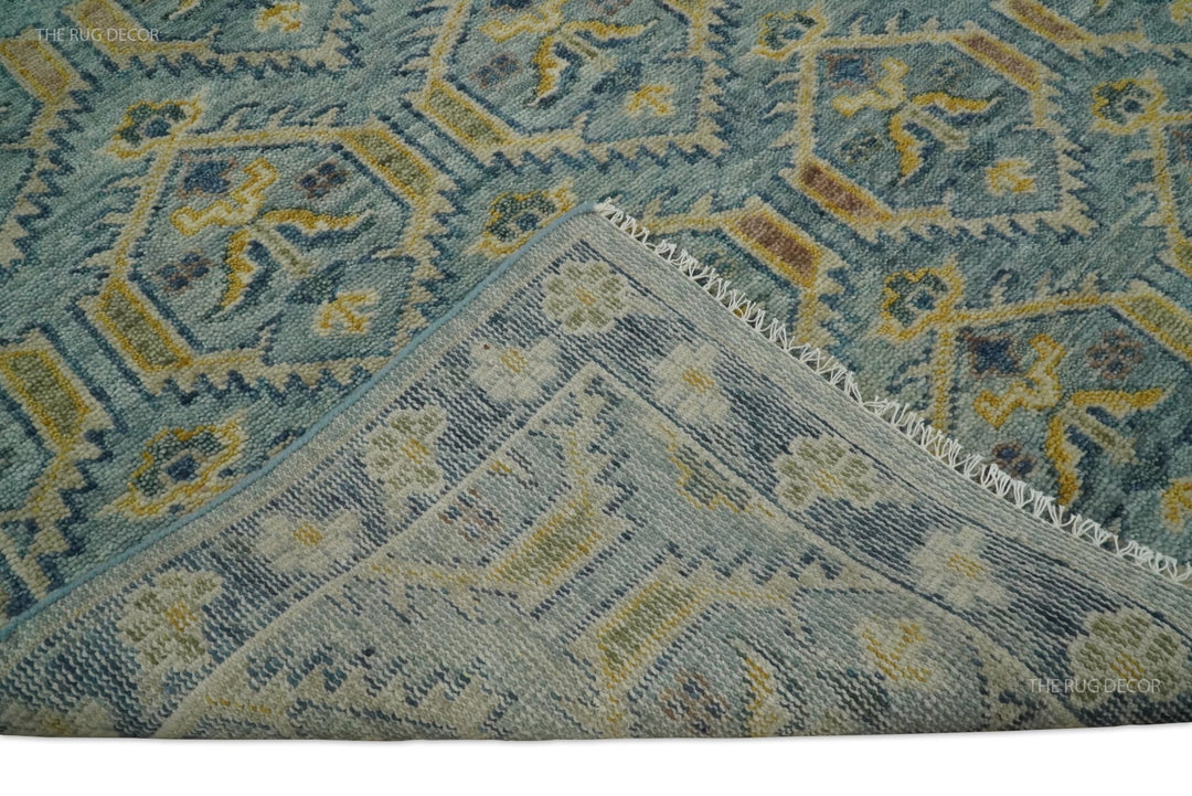 Folded rug corner reveals the woven underside and fringed edge of the wool rug
