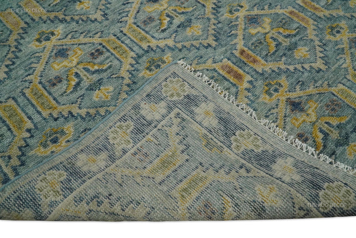 Folded rug corner reveals the woven underside and fringed edge of the wool rug