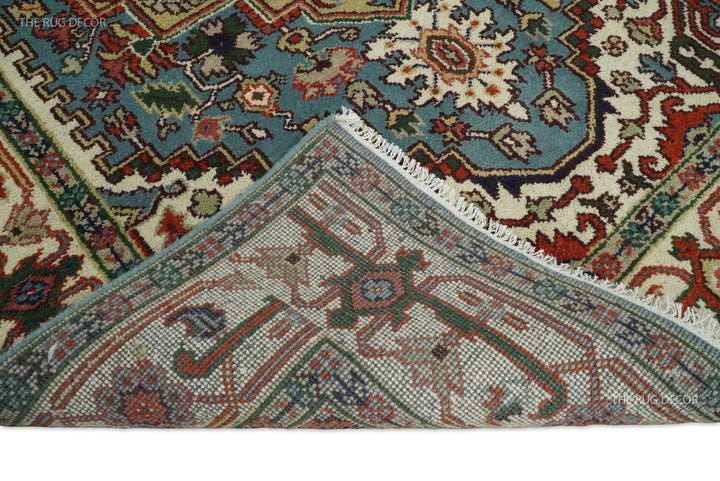 Rug underside folded back to show the woven backing and fringed edge