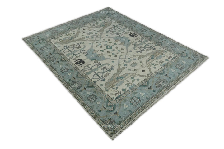 Angled full view of the blue and ivory floral Oushak wool rug