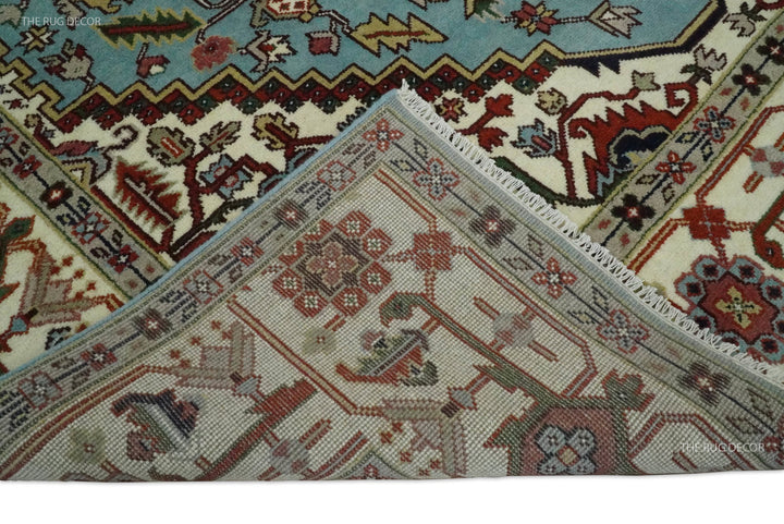 Folded rug corner showing the woven underside and patterned blue top