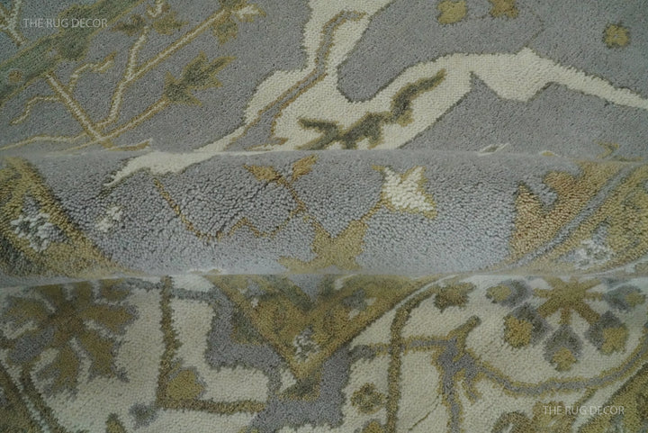 Close-up of the rug's pile, folded edge, and patterned border