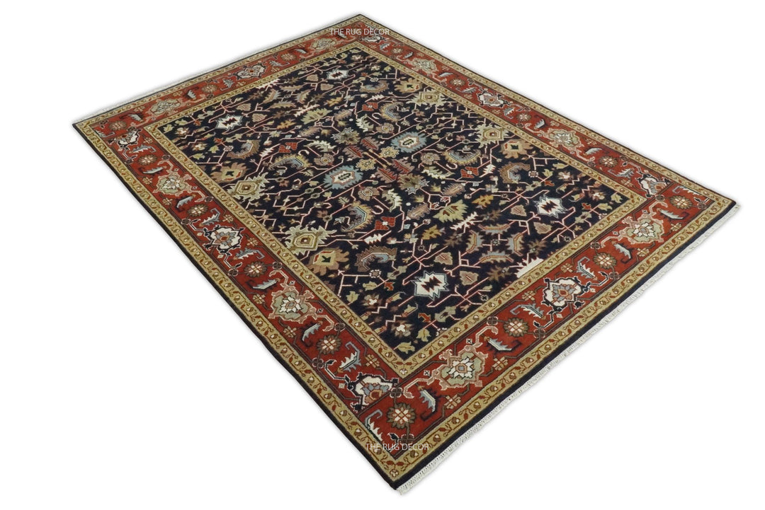 Angled view of the traditional blue and red hand-knotted wool rug