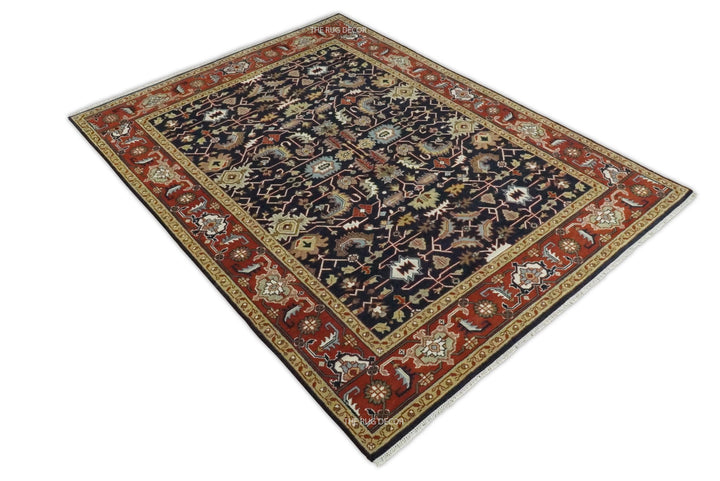 Angled view of the traditional blue and red hand-knotted wool rug