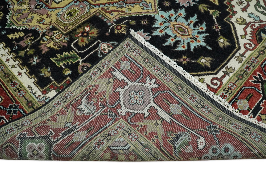 Hand-knotted wool rug pile texture and pattern detail in red, green, and black