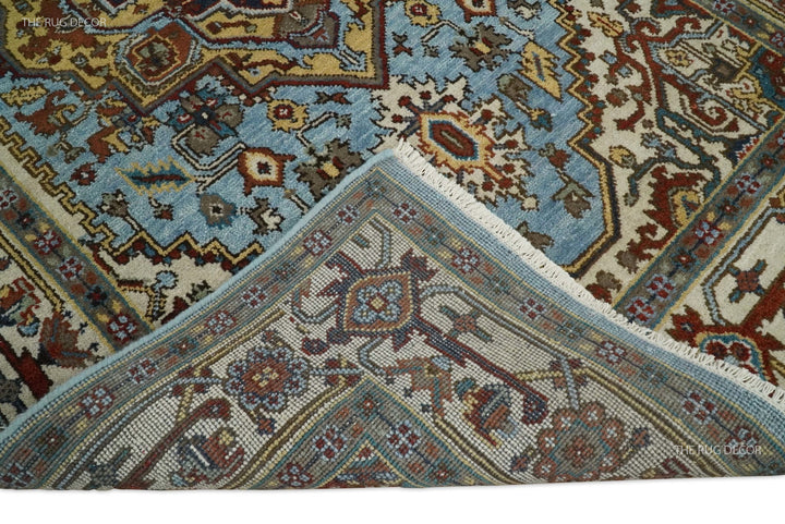 Sera rug underside and finished edge beside its blue and ivory patterned pile