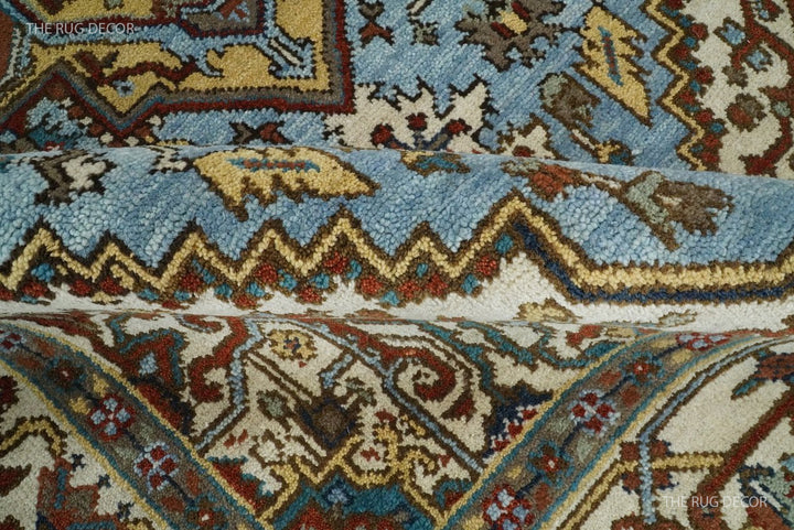 Sera rug close-up showing dense wool pile, blue field, and ivory patterned reverse