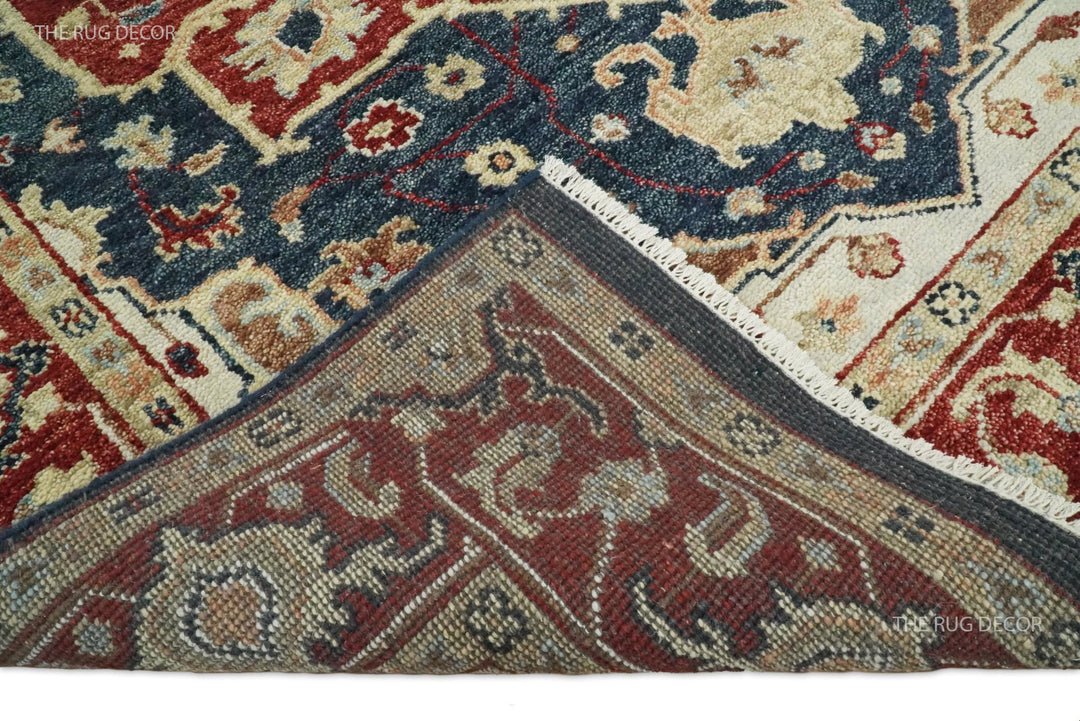 Rug underside folded back to show the woven backing and patterned wool surface