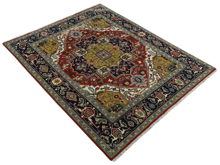 Rust and blue traditional Heriz Serapi area rug angled view with multicolor motifs