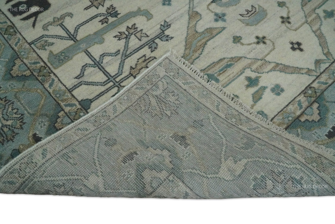 Turned-up rug corner shows the woven backing and patterned wool face