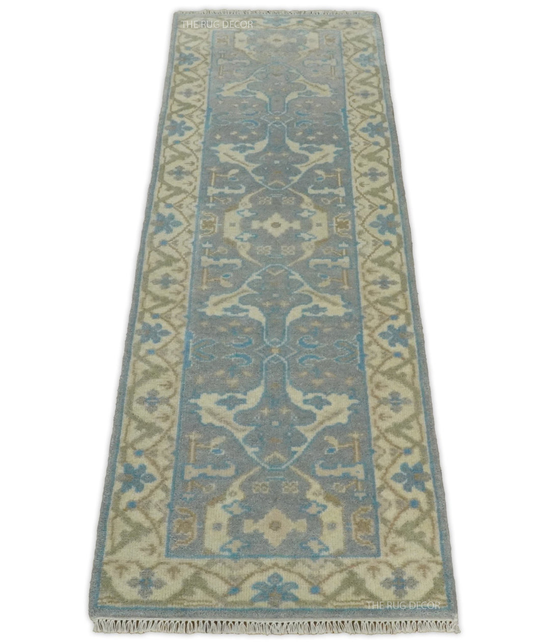 Long Oushak wool runner with blue floral motifs, beige border, and fringed ends